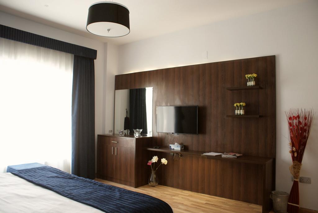 Weekend Hotel & Apartments Mascate Habitación foto
